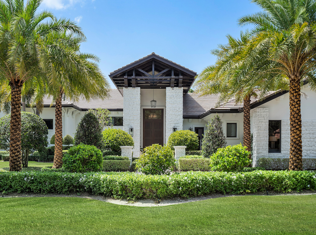 Meticulously Landscaped Custom Estate in Old Palm