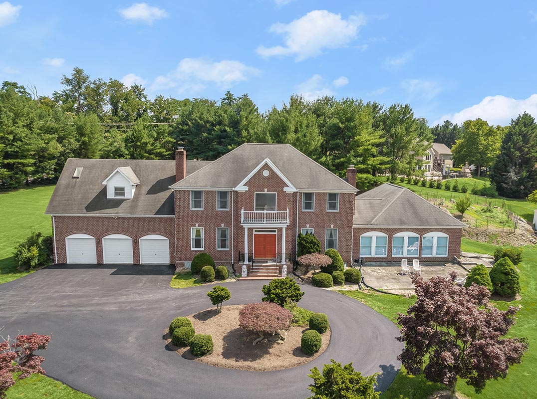 Brick Colonial | 8.4 Acres | Private Pond