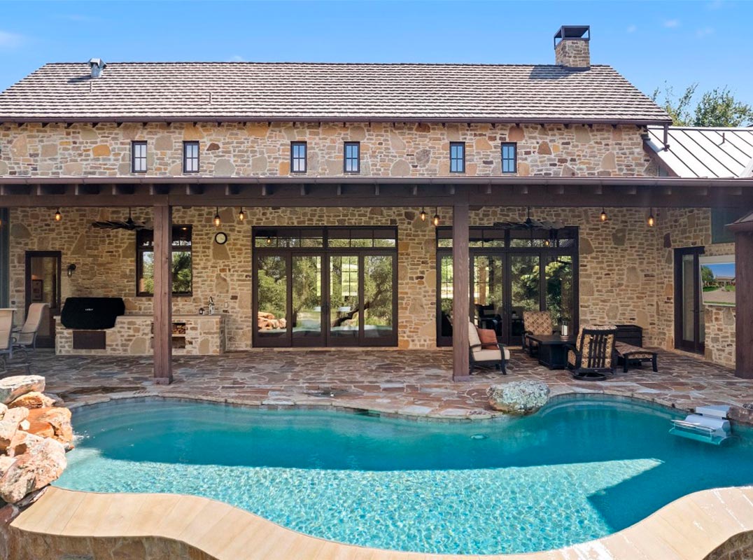 European-Inspired Charm and Private Oasis in Lake Travis’ Premier Community