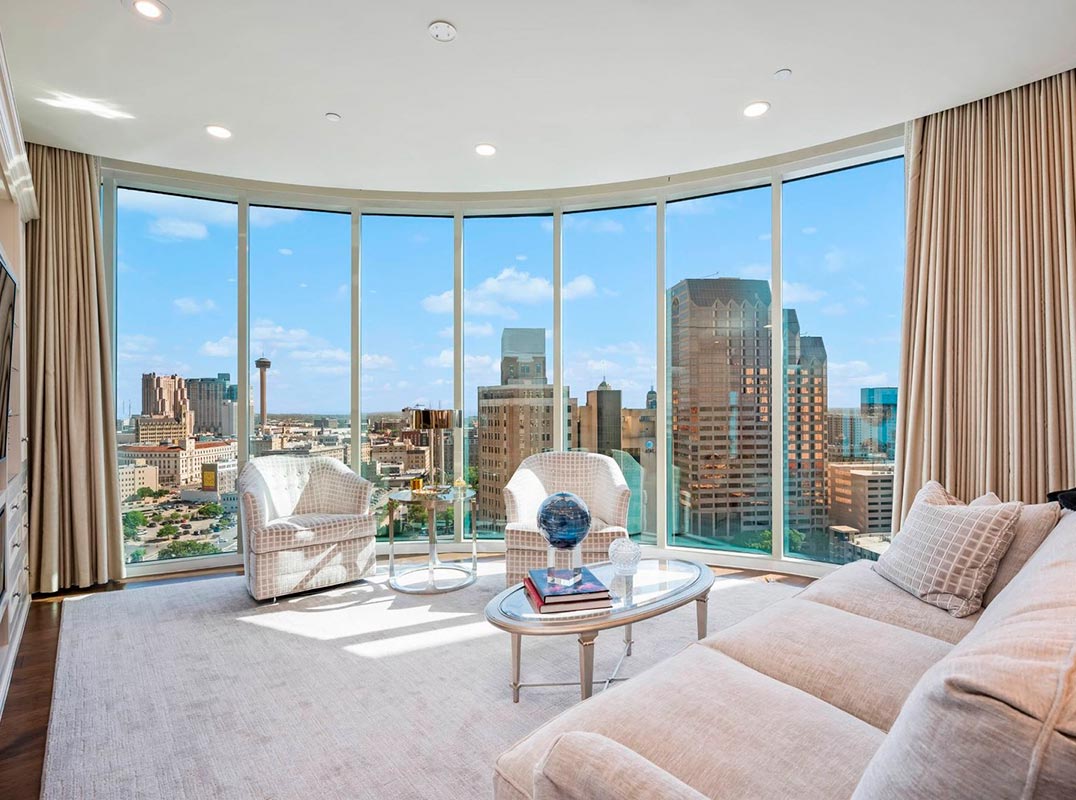 Stunning Downtown Views Through A Huge Curved Glass Wall.