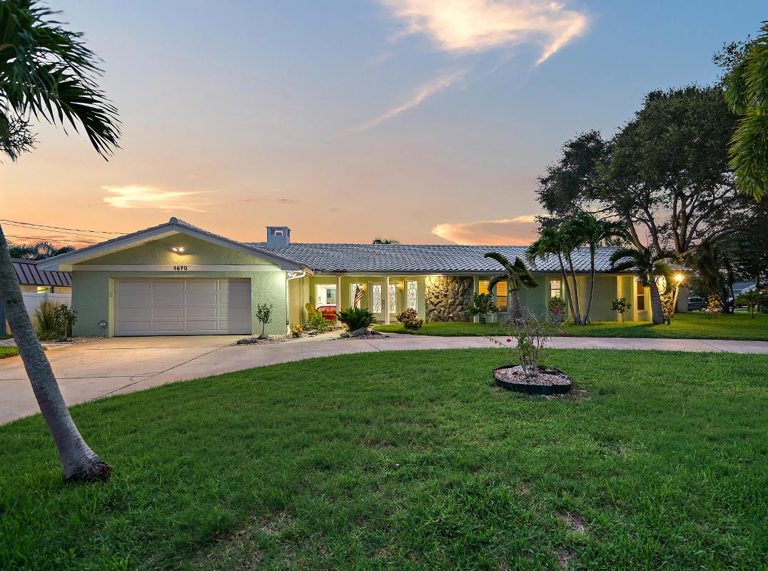 Waterfront Residence Nestled Within The Desirable Harbor Hills Community