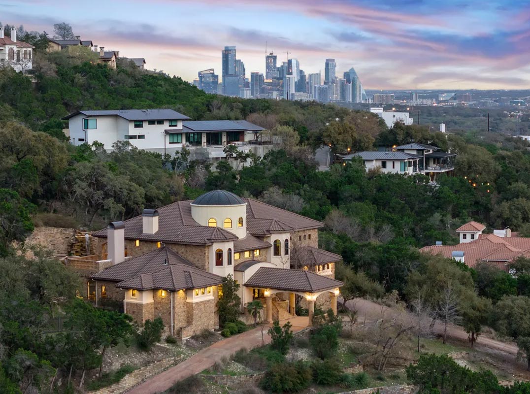 Exquisite West Lake Hills Estate with Breathtaking Water Features & Luxe Finishes