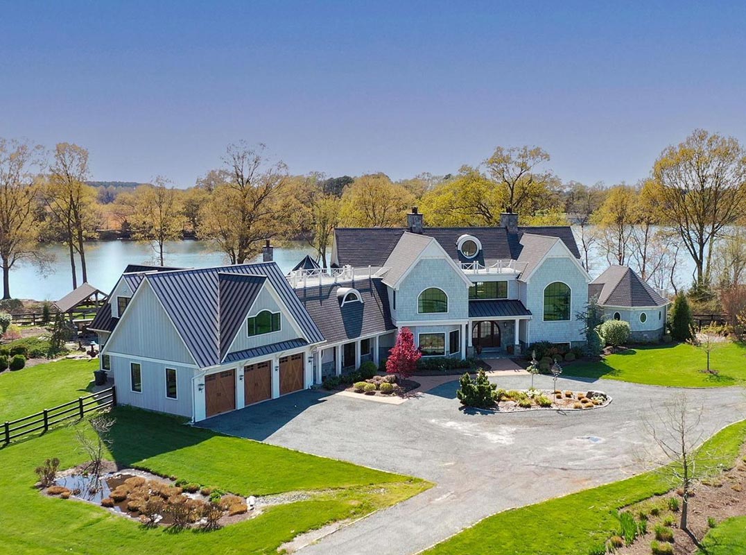 Breathtaking 37-Acre Waterfront Estate with Equestrian Facilities
