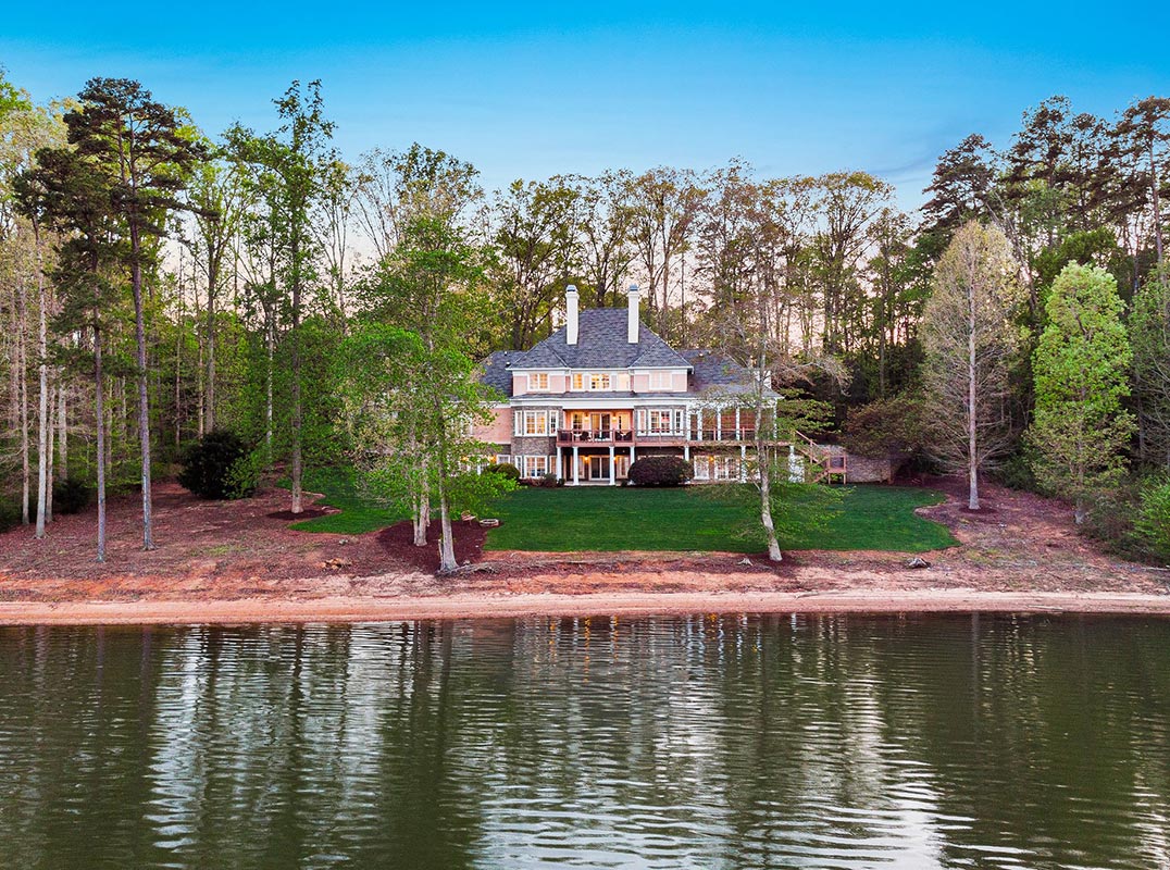 Serenity & Sophistication Await at this Lakeside Estate