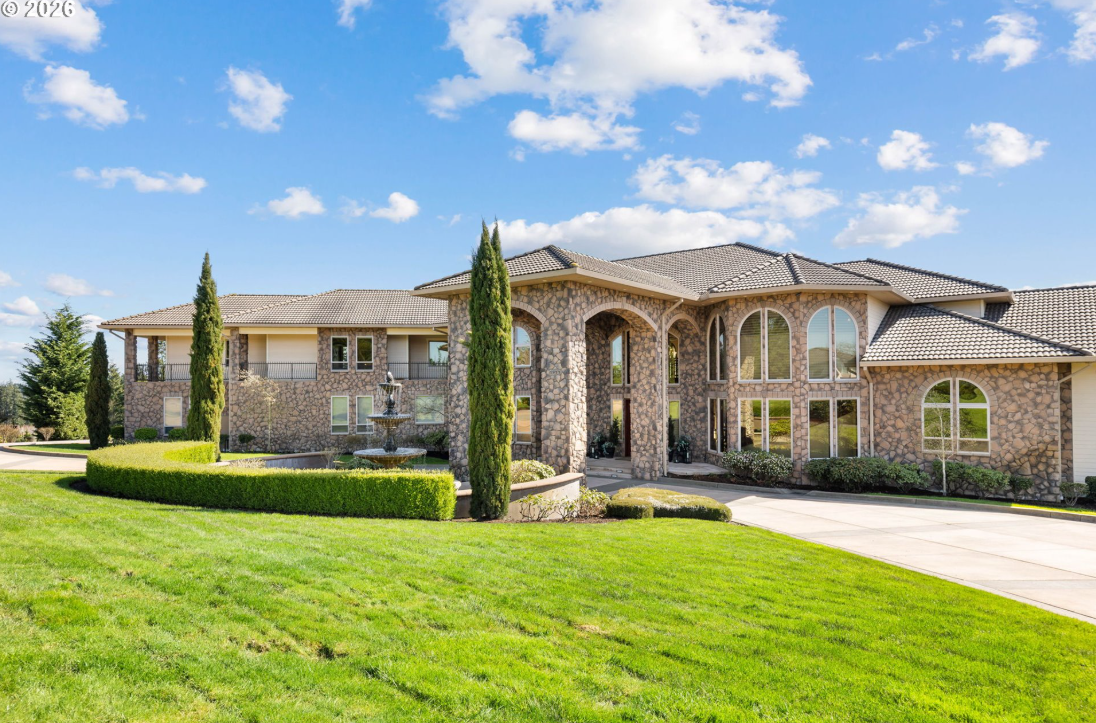 One of a Kind PNW Custom Estate Nestled in the Rolling Hills.