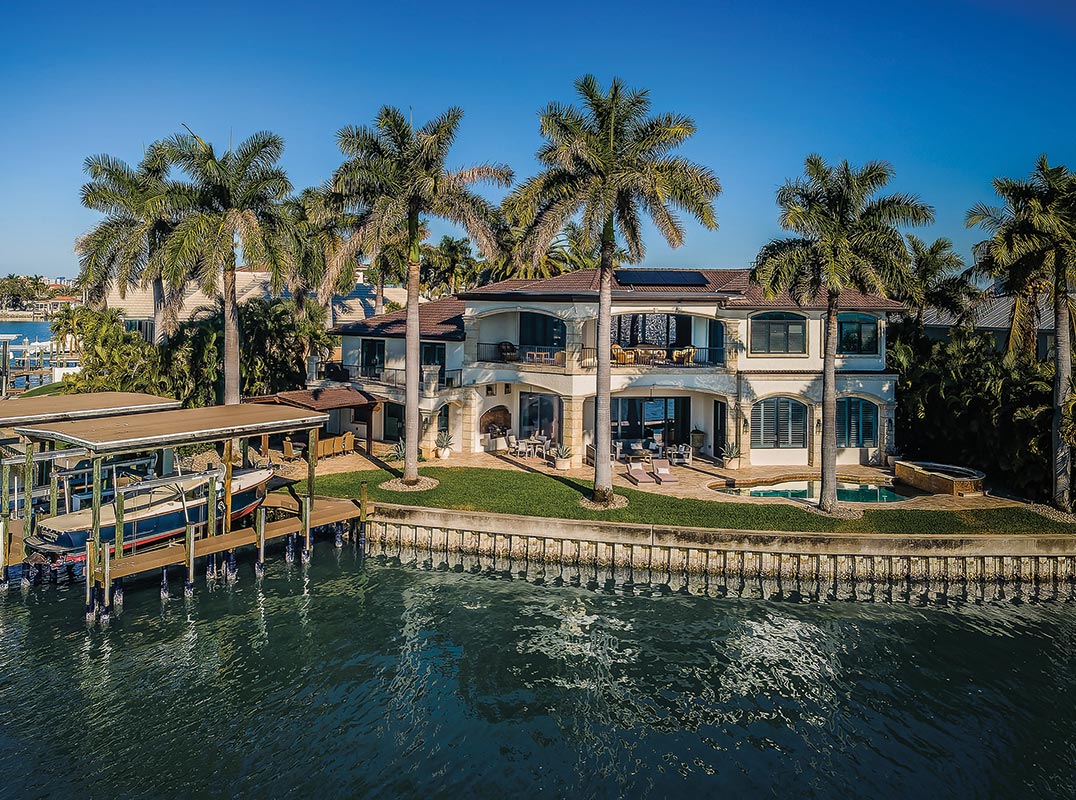Tuscan Style Waterfront Estate in the Yacht Club Estates