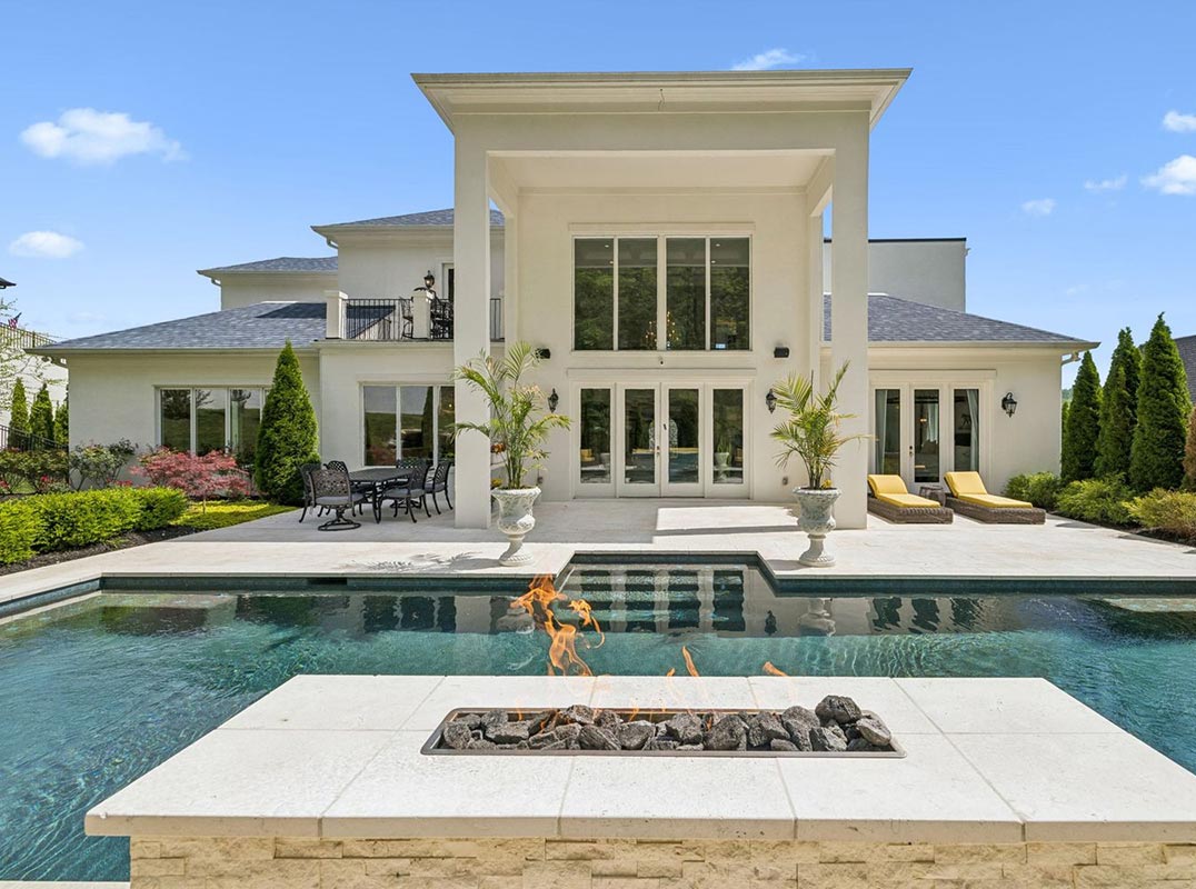 A Breathtaking Contemporary Estate With Clean Architectural Lines, A Resort-Style Pool, And Private Surroundings.
