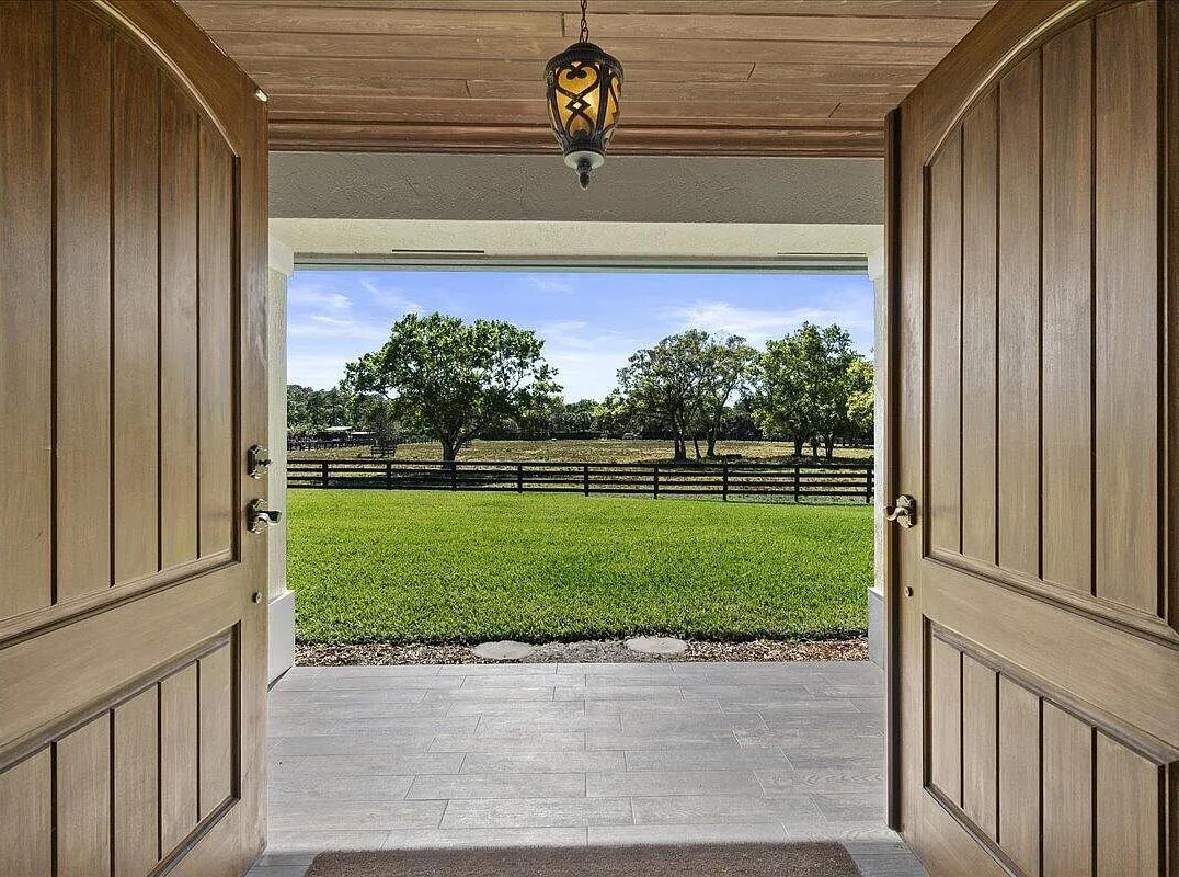 Rare 12-Acre Estate with Private Lake