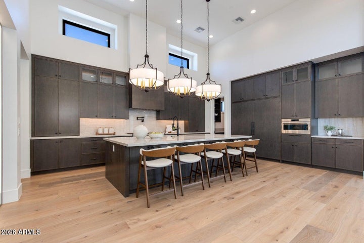 An Extraordinary New-Construction Estate Nestled On A Private One-Acre Homesite In Scottsdale's Coveted Cactus Corridor