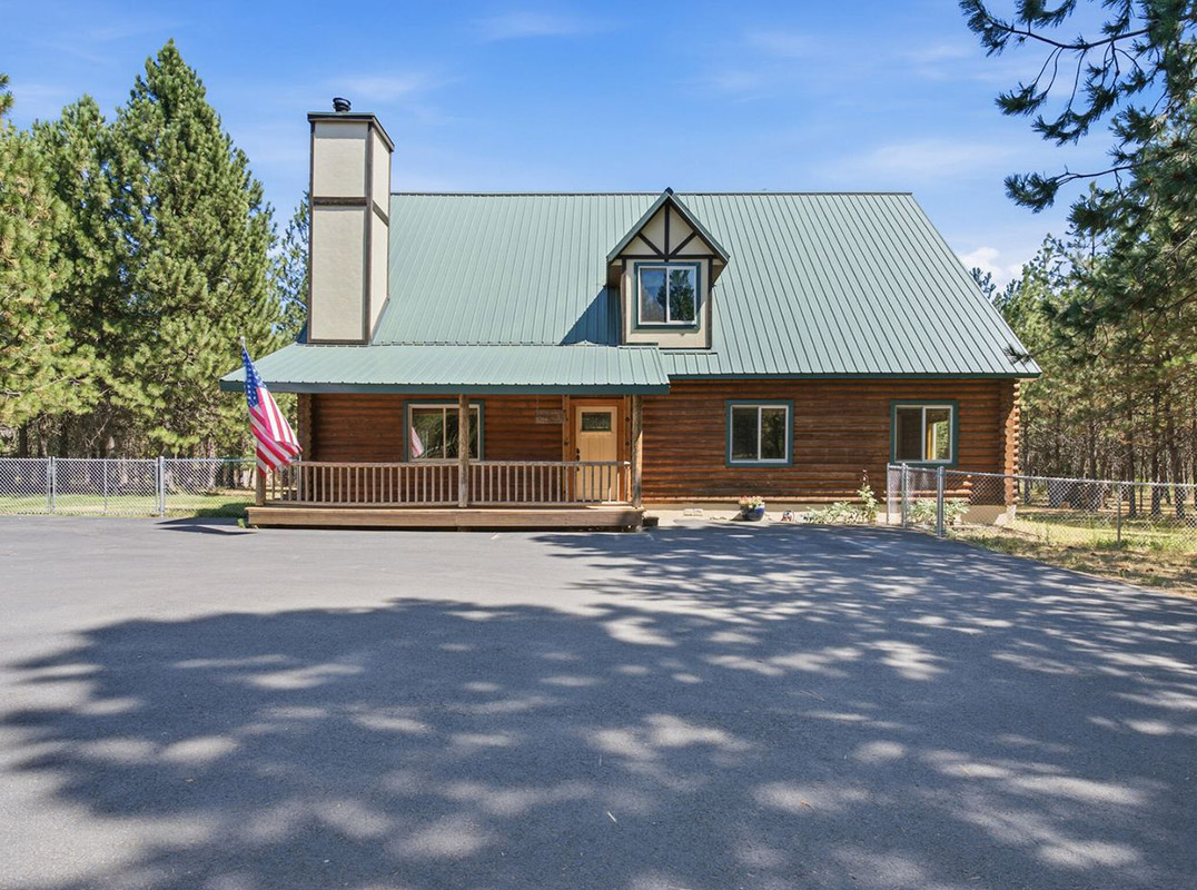 Beautifully Updated Authentic Log Home