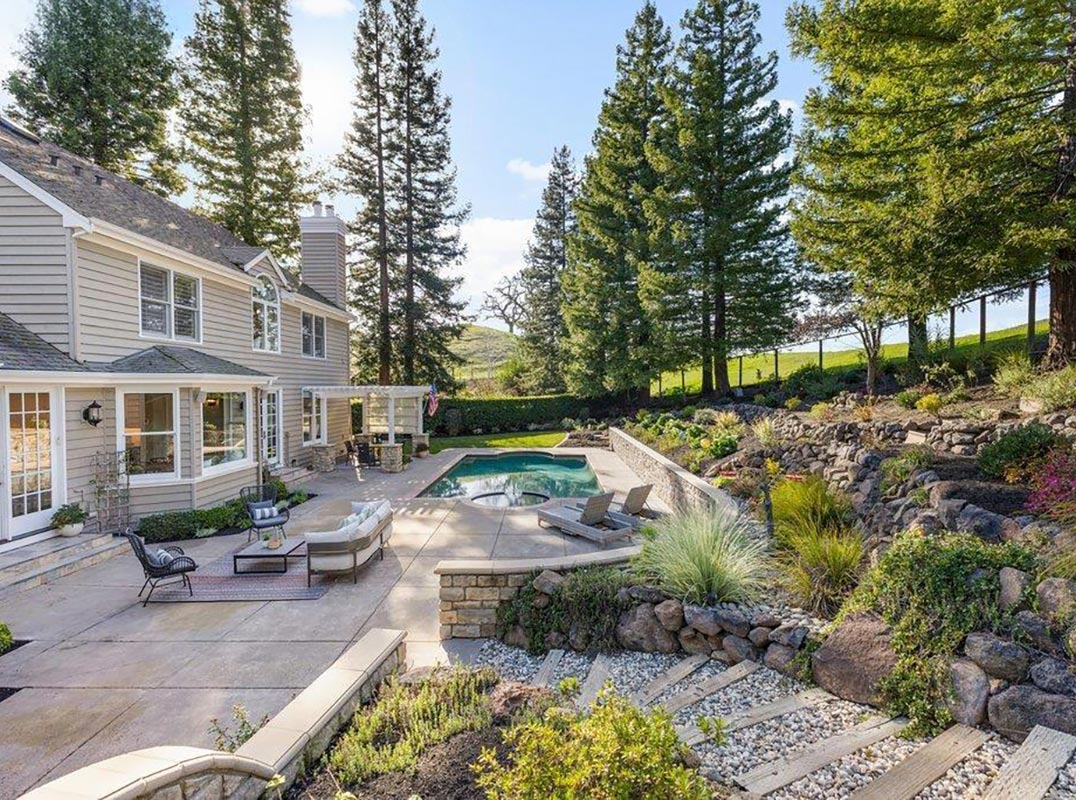 A Beautifully Customized Magee Ranch Retreat With Serene Outdoor Living