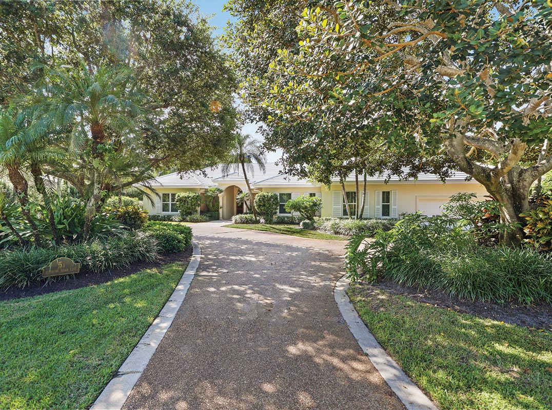 Timeless Elegance with Modern Comforts in the Village of Golf