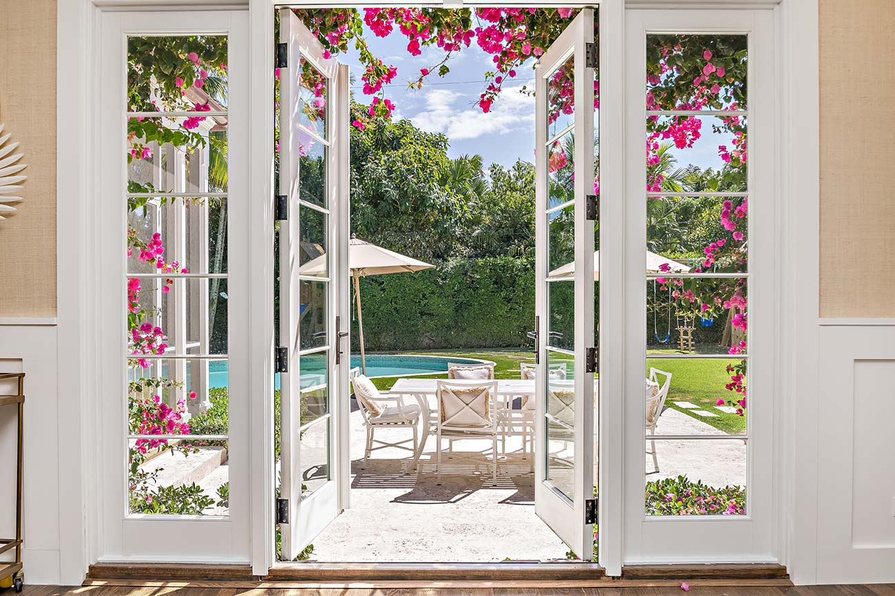 French doors draped in flowers